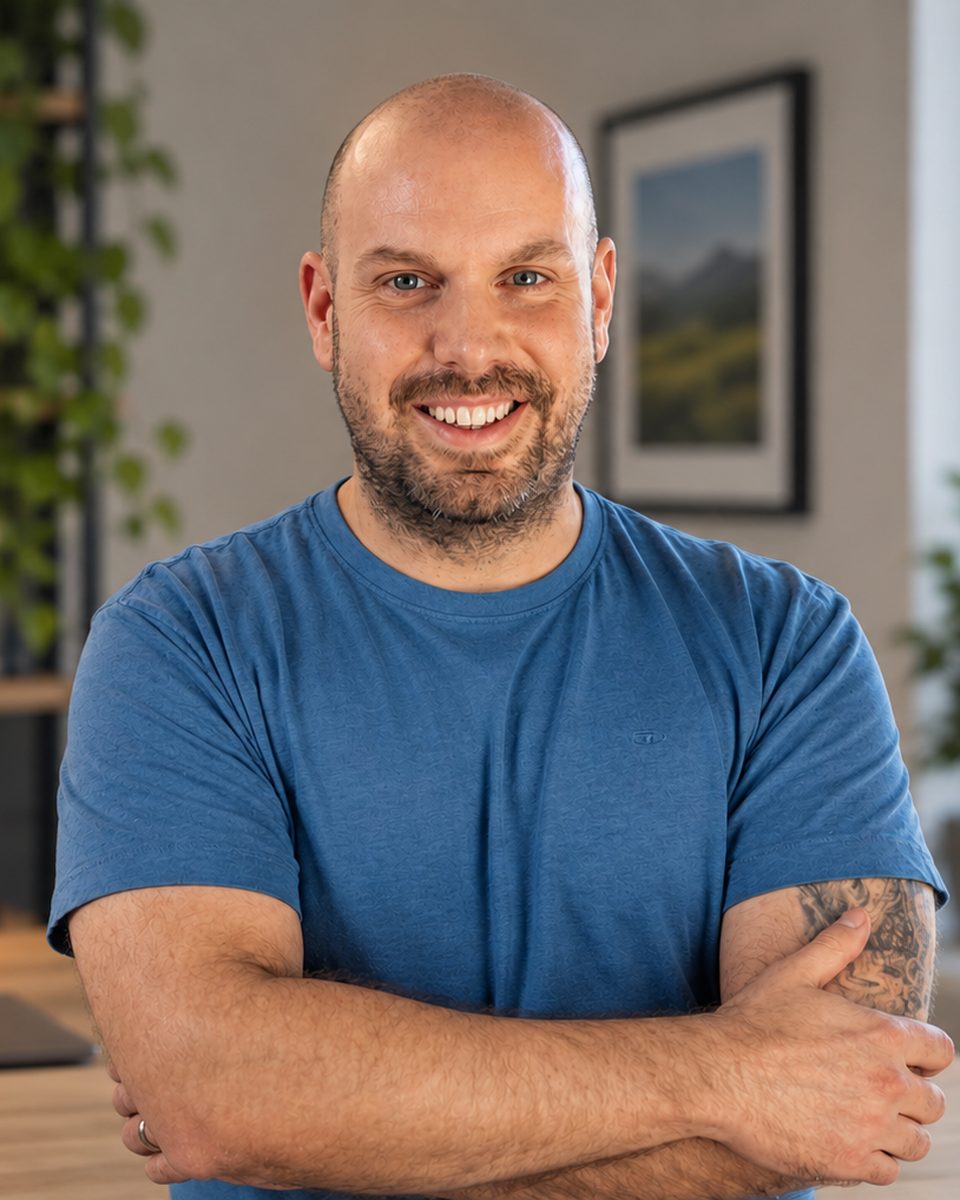 Adam Corby at his desk, Revenue Operations Consultant